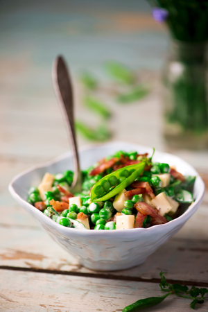 Creamy Green Pea Salad with Bacon.style rustic.selective focusの写真素材