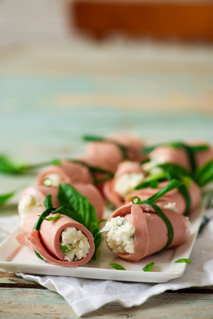 mortadella and ricotta rolls for a breakfast. selective focusの写真素材