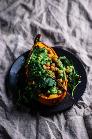 STUFFED SPAGHETTI SQUASH WITH CHICKPEAS and GARLICKY ARUGULA CREAM.selective focusの写真素材