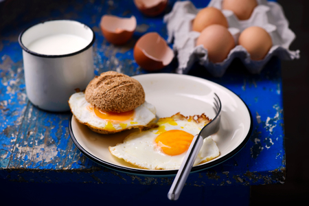 Breakfast fried Eggs with buns and cheese .selective focusの写真素材