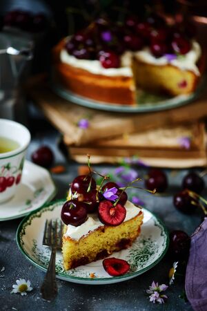cream cheese frosting cherry cake. style rustic. natural light.selective focusの写真素材