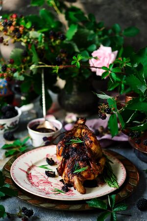 Chicken with blackberry sauce..style rustic.selective focusの写真素材