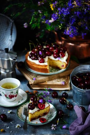 cream cheese frosting cherry cake. style rustic. natural light.selective focusの写真素材