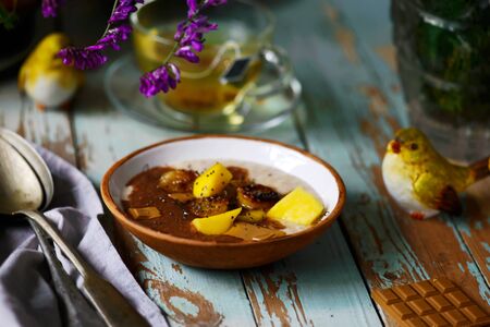 Chocolate Oatmeal with fruits and banana .selective focusの写真素材