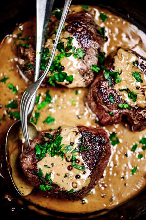Steak with peppercorn sauce.style rustic.selective focusの写真素材
