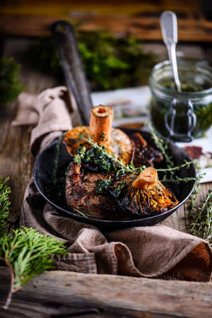 Steaks with thyme buttered mushrooms..style rustic.selective focusの写真素材
