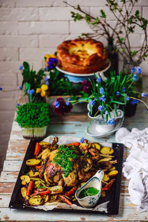 Easter chickens with herbs and lemon..style rustic.selective focus