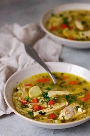 Chicken lemon orzo soup.style hugge.selective focusの写真素材