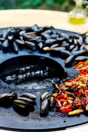 Grilled Catalan mussels .outdoor grilling.selective focusの写真素材