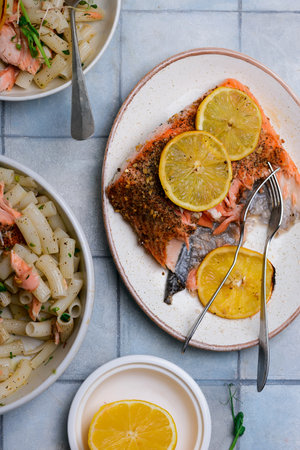 pasta with  lemon and baked salmon . style vintage.selective focusの写真素材
