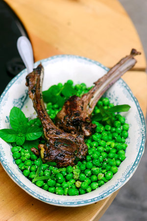 Lamb Chops Marinated with Mint and green pea. selective focusの写真素材