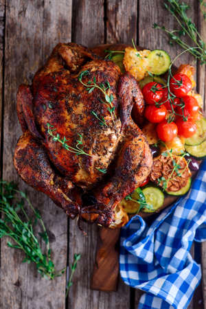 Roast chicken with vegetables.style rustic.selective focusの写真素材