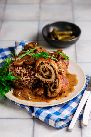 Beef rolls with mushrooms and sauce. rustic style. selective focusの写真素材