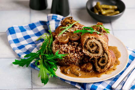 Beef rolls with mushrooms and sauce. rustic style. selective focusの写真素材