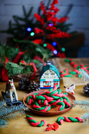 Christmas cookies in the form of a Christmas tree on a wooden backgroundの写真素材