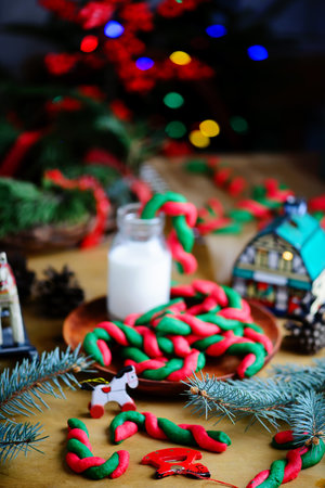 Christmas cookies in the shape of a Christmas tree on a wooden backgroundの写真素材