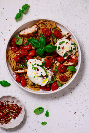 Italian Caprese salad with gnocchi and vegetables.top veiw. style hugge.selective focusの写真素材