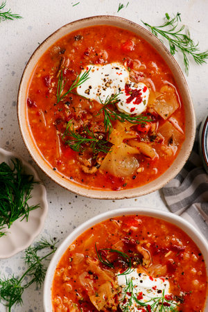 Cabbage roll soup in a ceramic bowl on a table. top veiw.style hugge.selective focusの写真素材