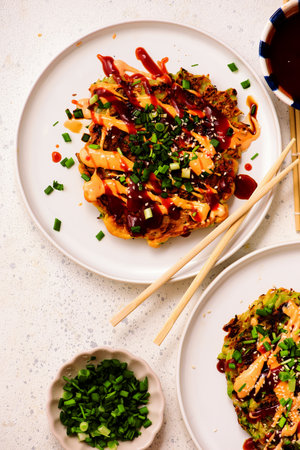 Okonomiyaki. Japanese vegetable pancakes.selective focusの写真素材