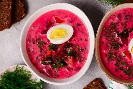 Polish summer vegetable soup made from beet tops with boiled egg botwinka .top veiw .selective focusの写真素材