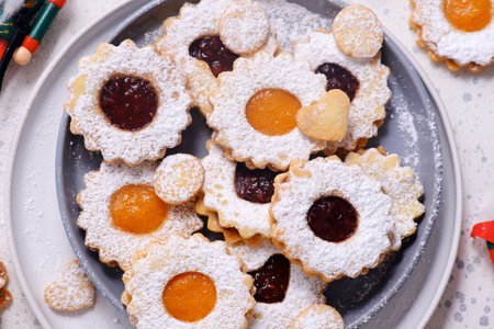 Traditional Christmas Linzer Cookies on a Christmas rustic background. Style rustic.top veiw .selective focusの写真素材