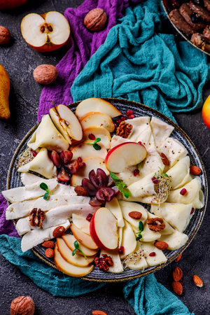 cheese plate with jam on a table in the garden .style rustic.selective focusの写真素材