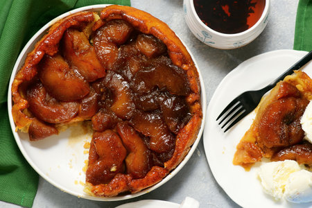 Traditional French apple pie Tarte Tatin with vanilla ice cream.selective focus.top veiwの写真素材