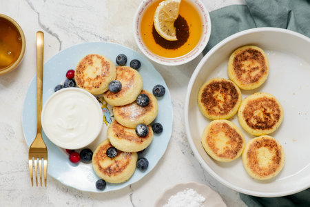 Cheese pancakes with yogurt and berries.selective focus