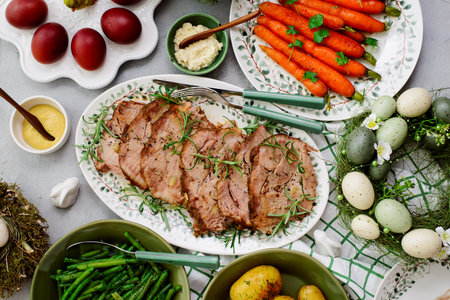 Easter baked pork, carrots, green beans and boiled potatoes.top veiw.selective focus