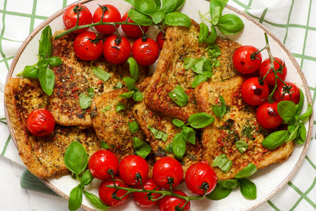 Easy Savory French Toast with Roasted Cherry Tomatoes and Basil..top view.selective focusの写真素材