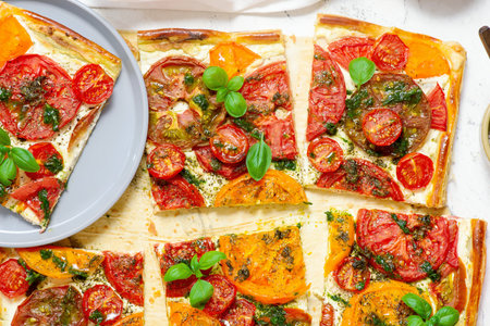 Cheese tomato and pesto tart.style rustic.selective focusの写真素材