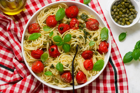 Roasted tomato and basil pasta.Style hugge.selective focus.top veiwの写真素材