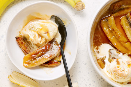 Banana split foster with ice cream. selective focus..Style vintageの写真素材