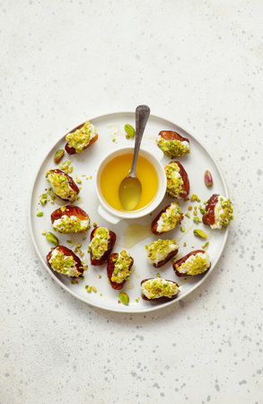 Honey Pistachio Ricotta stuffed Dates.top veiw.selective focusの写真素材
