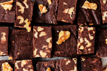 Chocolate fudge with walnuts. top view. selective focus