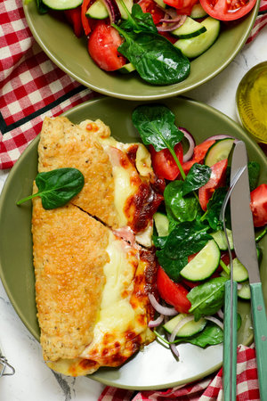 Protein Chicken Calzone with Vegetable Salad.selective focus