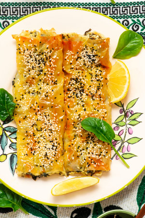 Filo pastry rollini with feta and spinach. Greek cuisine .top veiw .selective focus