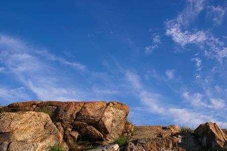 Boluders set against the skyの写真素材