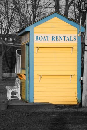 Yellow and blue boat rental shedの写真素材