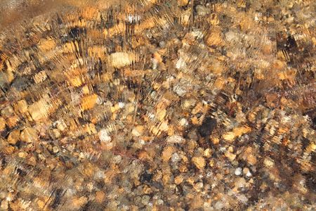 Lake pebbles under iceの写真素材