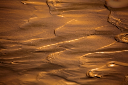 Flow structures in wet mud, as texture or background.の写真素材