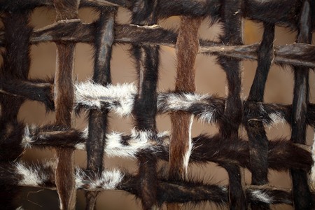 A network of leather stripes as texture or background.