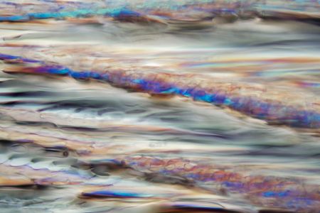 White wine under a microscope, Pinot gris. The photo shows crystals of frozen wine in polarized light.の写真素材