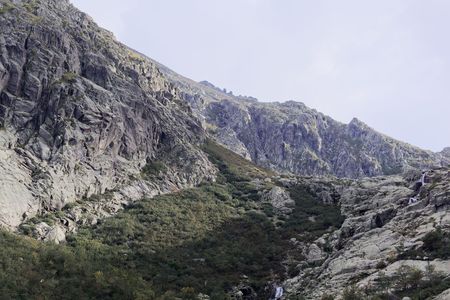 Mountains with clouds in the Restonica valley in Corsica, Franceの写真素材