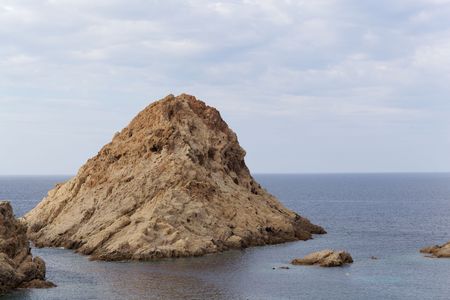 Rocks at the coast in Northern Corsica near Ile Rousse, France.