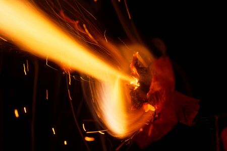 Macro photo of an exploding Sylvester firecracker.