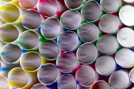 Macro photo of drinking tubes with different colored stripes.の写真素材
