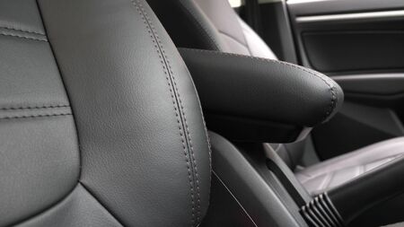 beautiful leather car interior design. faux leather front seats in the car. luxury leather seats in...