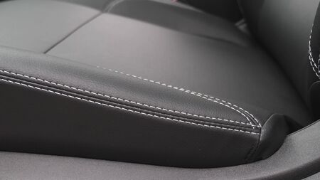 stylish black leather seats in the car. beautiful leather car interior design. luxury leather seats...