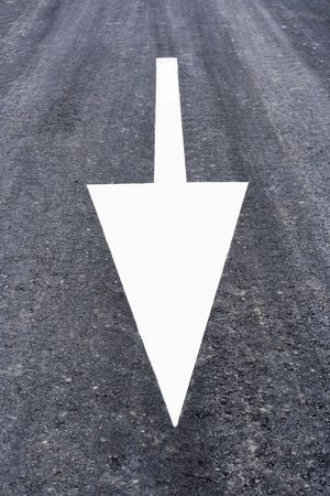 Traffic sign of obligation printed in the asphalted roadの写真素材